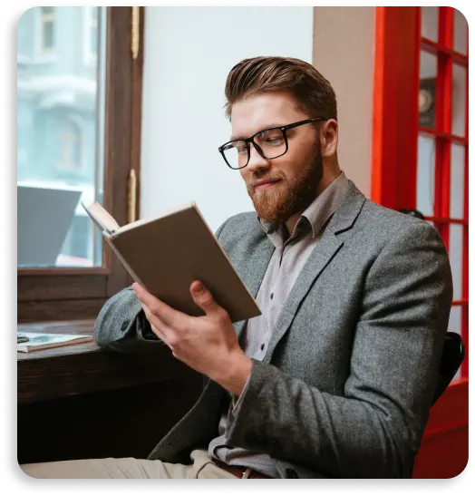 a book with a picture of a person walking on a path